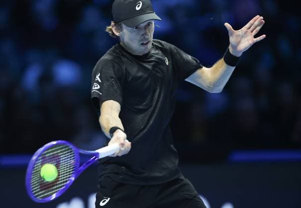 (251116) -- TURIN, Nov. 16, 2025 -- Alex De Minaur returns a shot during the men s singles semifinal match between Jannik Sinner of Italy and Alex De Minaur of Australia at the ATP, Tennis Herren Finals tennis tournament in Turin, Italy, on Nov. 15, 2025. ) (SP) ITALY-TURIN-ATP FINALS-MEN S SINGLES-SEMIFINAL LixJing 