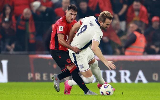 Qazim Laci of Albania and Harry Kane of England. Albania v England, FIFA 2026 World Cup Qualifying, Group K, Football, Arena Kombetare, Tirana, Albania - 16 Nov 2025Tirana Arena Kombetare Albania EDITORIAL USE ONLY No use with unauthorised audio, video, data, fixture lists, club league logos or live services. Online in-match use limited to 120 images, no video emulation. No use in betting, games or single club league player publications.  Copyright: xNikolaxKrstic Shutterstockx 15786244ar