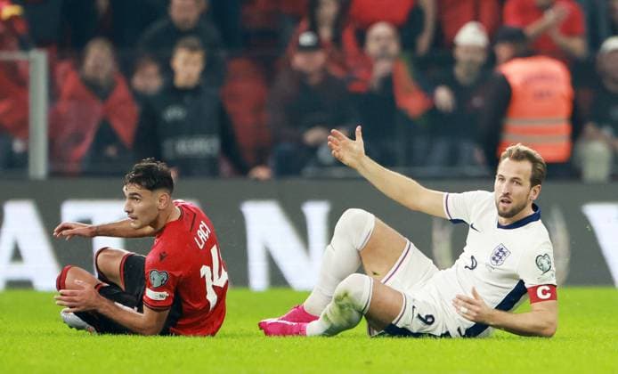 Qazim Laci of Albania and Harry Kane of England. Albania v England, FIFA 2026 World Cup Qualifying, Group K, Football, Arena Kombetare, Tirana, Albania - 16 Nov 2025Tirana Arena Kombetare Albania EDITORIAL USE ONLY No use with unauthorised audio, video, data, fixture lists, club league logos or live services. Online in-match use limited to 120 images, no video emulation. No use in betting, games or single club league player publications.  Copyright: xNikolaxKrstic Shutterstockx 15786244as