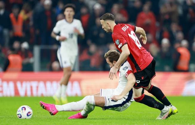 Harry Kane of England and Ardian Ismajli of Albania. Albania v England, FIFA 2026 World Cup Qualifying, Group K, Football, Arena Kombetare, Tirana, Albania - 16 Nov 2025Tirana Arena Kombetare Albania EDITORIAL USE ONLY No use with unauthorised audio, video, data, fixture lists, club league logos or live services. Online in-match use limited to 120 images, no video emulation. No use in betting, games or single club league player publications.  Copyright: xNikolaxKrstic Shutterstockx 15786244bd