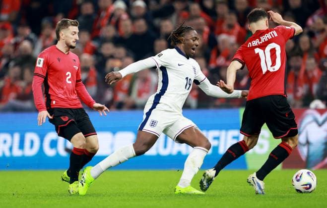 Eberechi Eze of England and Nedim Bajrami of Albania. Albania v England, FIFA 2026 World Cup Qualifying, Group K, Football, Arena Kombetare, Tirana, Albania - 16 Nov 2025Tirana Arena Kombetare Albania EDITORIAL USE ONLY No use with unauthorised audio, video, data, fixture lists, club league logos or live services. Online in-match use limited to 120 images, no video emulation. No use in betting, games or single club league player publications.  Copyright: xNikolaxKrstic Shutterstockx 15786244bw