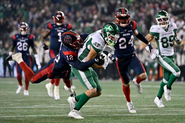 November 16, 2025, Winnipeg, Mb, CANADA: Saskatchewan Roughriders Tommy Nield (83) gets taken down by Montreal Alouettes Najee Murray (12) after running 34 yards to the Montreal one-yard line for first down during second half CFL football action at the 112th Grey Cup, in Winnipeg on Sunday, Nov. 16, 2025. Canada News - November 16, 2025  - ZUMAc35_ 20251116_zaf_c35_123 Copyright: xFredxGreensladex