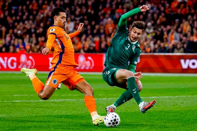 Tijjani Reijnders of the Netherlands shoots under pressure from Edgaras Utkus of Lithuania and scores the 1-0 Netherlands v Lithuania, FIFA World Cup, WM, Weltmeisterschaft, Fussball 2026 Qualifier, Netherlands v Lithuania, Johan Cruijff Arena, November 17, 2025, Amsterdam, Netherlands.
