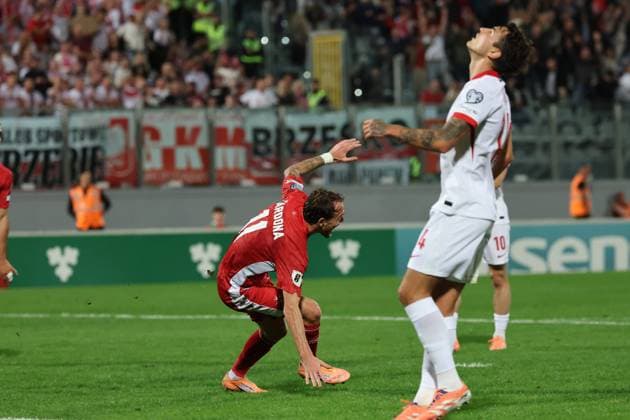 Irvin Cardona (left) of Malta reacts in celebration after scoring the 1-1 goal during the FIFA World Cup, WM, Weltmeisterschaft, Fussball 26 UEFA European Qualifier Group G match between Malta and Poland, at the National Stadium, in Ta Qali, Malta, 17 November 2025. FIFA World Cup 26 Qualifiers - Malta vs Poland