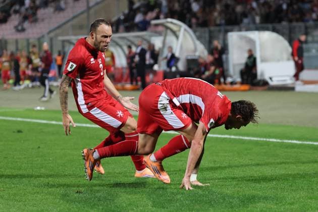Irvin Cardona (left) of Malta reacts in celebration after scoring the 1-1 goal during the FIFA World Cup, WM, Weltmeisterschaft, Fussball 26 UEFA European Qualifier Group G match between Malta and Poland, at the National Stadium, in Ta Qali, Malta, 17 November 2025. FIFA World Cup 26 Qualifiers - Malta vs Poland
