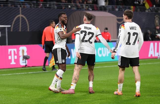 17.11.2025, xtgx, Fussball WM-Qualifikation 2026, Deutschland - Slowakei v.l. Ridle Baku (Deutsche Fussball Nationalmannschaft DFB), David Raum (Deutsche Fussball Nationalmannschaft DFB), celebrate the goal, Der Torjubel zum 5:0 (DFL DFB REGULATIONS PROHIBIT ANY USE OF PHOTOGRAPHS as IMAGE SEQUENCES and or QUASI-VIDEO) Leipzig