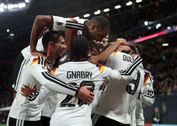 17.11.2025, xtgx, Fussball WM-Qualifikation 2026, Deutschland - Slowakei v.l. Felix Nmecha (Deutsche Fussball Nationalmanschaft DFB), Forzan Assan Quedraogo (Deutsche Fussball Nationalmannschaft DFB), Nathaniel Brown (Deutsche Fussball Nationalmannschaft DFB) celebrate the goal, Der Torjubel zum 6:0 (DFL DFB REGULATIONS PROHIBIT ANY USE OF PHOTOGRAPHS as IMAGE SEQUENCES and or QUASI-VIDEO) Leipzig