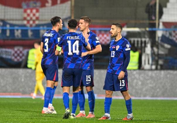 Montenegro v Croatia - FIFA World Cup, WM, Weltmeisterschaft, Fussball 2026 Qualifier PODGORICA, MONTENEGRO - NOVEMBER 17: Mario Pasalic, Nikola Vlasic and Ivan Perisic of Croatia celebrate their second goal during the FIFA World Cup 2026 qualifier match between Montenegro and Croatia at Podgorica City Stadium on November 17, 2025 in Podgorica, Montenegro.  StefanxIvanovic PIXSELL