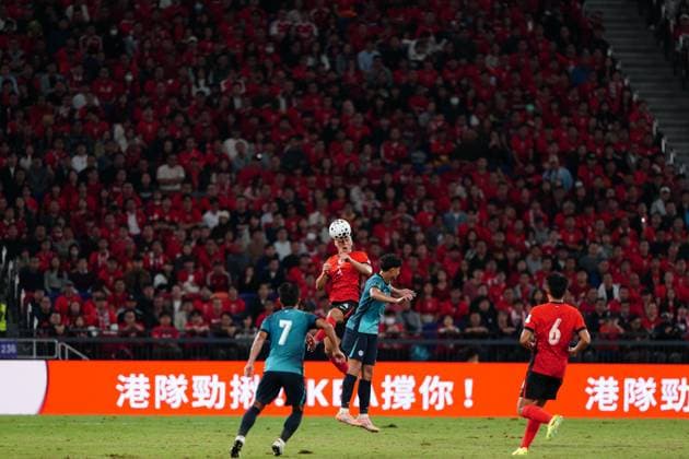 Asian cup qualify Hong Kong vs Singapore Hong Kong player and Singapore player during the match of Asian cup qualify on November 18, 2025 in Hong Kong. (Photo by Ellan Mad Nexpher Images) Hong Kong