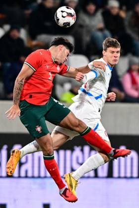 Goncalo Oliveira of Portugal, left, and Lukas Masek of Czech Republic in action during the European Championship, EM, Europameisterschaft 2027 U21, U 21 Group B qualification match Czech Republic vs Portugal in Hradec Kralove, Czech Republic, November 18, 2025. (CTKxPhoto DavidxTanecek) CTKPhotoP2025111807013  CTKPhotoP2025111807013