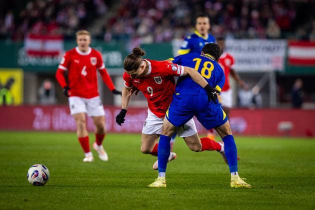 AUSTRIA - BOSNIA AND HERZEGOVINA Marcel Sabitzer of Austria and Emir Karic of Bosnia and Herzegovina during European qualifier of FIFA World Cup, WM, Weltmeisterschaft, Fussball WM, Weltmeisterschaft, Fussball 2026 football match between Austria and Bosnia and Herzegovina. Ernst Happel Stadion, Vienna, Austria, November 18, 2025. Photo by Branislav Racko Copyright: xx 080A0379