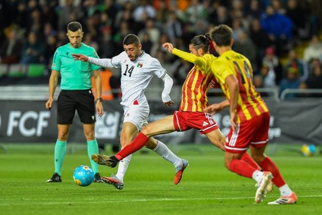 CATALONIA v PALESTINE LLUIS COMPANYS OLYMPIC STADIUM,BARCELONA. November 18,2025 CATALONIA - PALESTINE November 18,2025 Khaled Al-Nabris of Palestine vies with Albert Orriols (18) of Catalonia during the friendly match between the national teams of Catalonia and Palestine at Estadi Olimpic Lluis Companys Olympic Stadium of Montjuic in Barcelona, Spain, on November 18, 2025. Barcelona ESP Copyright: xS.xRosx