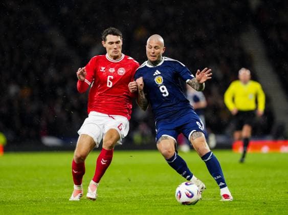 Andreas Christensen of Denmark & Lyndon Dykes of Scotland. Scotland v Denmark, FIFA 2026 World Cup Qualifying, Group C, Football, Hampden Park, Glasgow, Scotland, UK - 18 Nov 2025Glasgow Hampden Park United Kingdom EDITORIAL USE ONLY No use with unauthorised audio, video, data, fixture lists, club league logos or live services. Online in-match use limited to 120 images, no video emulation. No use in betting, games or single club league player publications. Copyright: xStuartxWallace Shutterstockx 15846619z