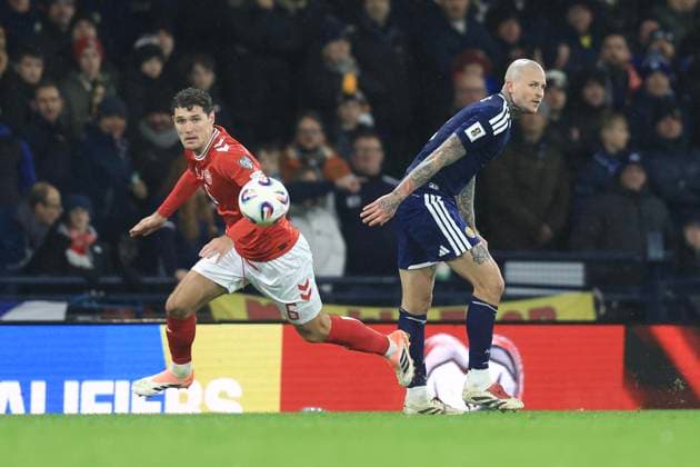 18th November 2025; Hampden Park, Glasgow, Scotland; FIFA World Cup, WM, Weltmeisterschaft, Fussball Qualifiers International Football, Scotland versus Denmark; Andreas Christensen of Denmark goes past the challenge from Lyndon Dykes of Scotland  DavidxYoung