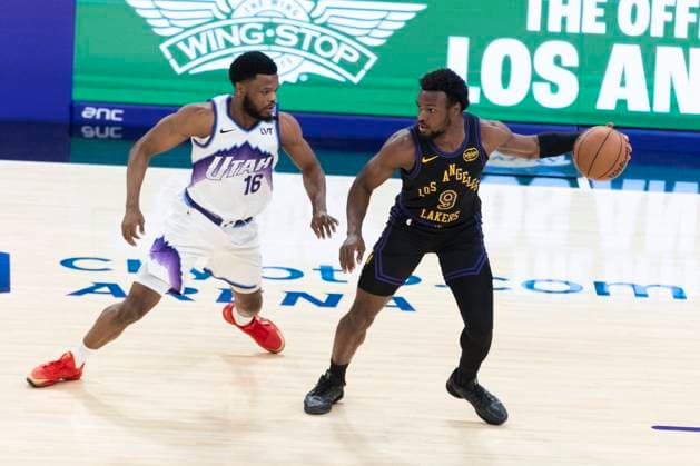November 18, 2025, Los Angeles, California, USA: Los Angeles LakersÃ¢â‚¬â ¢ Bronny James (9) is defended by Utah Jazz s Elijah Harkless (16) during an NBA, Basketball Herren, USA basketball game, in Los Angeles Tuesday, Nov. 18, 2025. Los Angeles USA - ZUMAc68_ 20251118_zaf_c68_042 Copyright: xRingoxChiux