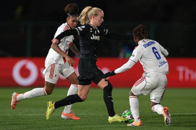 Biella, Italy, 19th November 2025. Amalie Jorgensen Vangsgaard of Juventus is pursued by Tarciane and Melchie Dumornay of OL Lyonnes during the Juventus Women vs Lyonnes UEFA Womens Champions League match at Stadio Vittorio Pozzo, Biella. Picture credit should read: Jonathan Moscrop Sportimage EDITORIAL USE ONLY. No use with unauthorised audio, video, data, fixture lists, club league logos or live services. Online in-match use limited to 120 images, no video emulation. No use in betting, games or single club league player publications. SPI_002_JM_JUVE_LYONNES_UWCL SPI-4295-0002