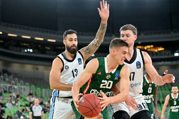 Ljubljana, Slovenia, November 19 2025, Miha Cerkvenik of Cedevita Olimpija (C) in action against Martin Breunig of Veolia Towers (L) during the BKT EuroCup basketball match between Cedevita Olimpija (Slovenia) and Veolia Towers (Germany) at Arena Stozice, Ljubljana, Slovenia. (Photo by Igor Kupljenik Sports Press Photo) Copyright: xIgorxKupljenikx xSPPx Sportspressphoto_SPR63672