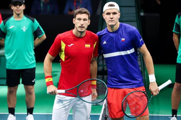Jakub MENSIK (CZE) and Pablo CARRENO BUSTA (ESP) during Davis Cup - Final Eight, International Tennis match in Bologna, Italy, November 20 2025  Copyright: xRobertaxCorradin IPAxSportx xipa-agency.netx xx IPA_68162084 IPA_Agency_IPA68162084