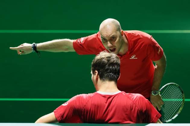 Belgian captain Steve Darcis and Belgian Raphael Collignon pictured during a tennis match against Italian Berrettini, the first in the Davis Cup semifinals between Belgium and Italy, in Bologna, Italy, on Friday 21 November 2025. The Davis Cup top eight Finals take place in Bologna from November 18 to 23. BENOITxDOPPAGNE  x143257401x