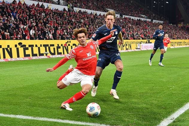 21.11.2025, xhbx, Fussball 1.Bundesliga, FSV Mainz 05 - TSG Hoffenheim v.l. Kaishu Sano (FSV Mainz 05), Wouter Burger (TSG 1899 Hoffenheim) (DFL DFB REGULATIONS PROHIBIT ANY USE OF PHOTOGRAPHS as IMAGE SEQUENCES and or QUASI-VIDEO) Mainz