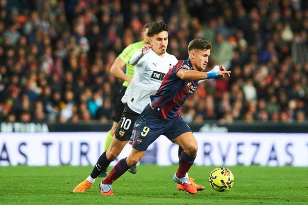 Ivan Romero (Levante UD) and Andre Almeida (Valencia CF) during the LaLiga EA Sports match between Valencia CF and Levante UD at Estadio de Mestalla on December 21, 2025 in Valencia, Spain. (Photo by Maria Jose Segovia DeFodi Images)