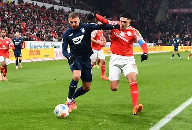 21.11.2025, xhbx, Fussball 1.Bundesliga, FSV Mainz 05 - TSG Hoffenheim v.l. Grische Prömel (TSG 1899 Hoffenheim), Nadiem Amiri (FSV Mainz 05) (DFL DFB REGULATIONS PROHIBIT ANY USE OF PHOTOGRAPHS as IMAGE SEQUENCES and or QUASI-VIDEO) Mainz
