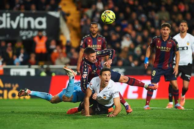 Cesar Tarrega (Valencia CF) and Adrian Dela, De la Fuente during the LaLiga EA Sports match between Valencia CF and Levante UD at Estadio de Mestalla on December 21, 2025 in Valencia, Spain. (Photo by Maria Jose Segovia DeFodi Images)