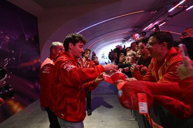 Formula 1 Grand Prix of Las Vegas 2025 LAS VEGAS, NEVADA - NOVEMBER 21: Charles Leclerc of Scuderia Ferrari is signing a hat before Practice 3 session at Formula 1 Grand Prix 2025 of Las Vegas at Las Vegas Strip Circuit on November 21, 2025 in Las Vegas, Nevada, United States. Tayfun Coskun Anadolu Nevada United States. Editorial use only. Please get in touch for any other usage.  Copyright: x2025xAnadoluxTayfunxCoskunx