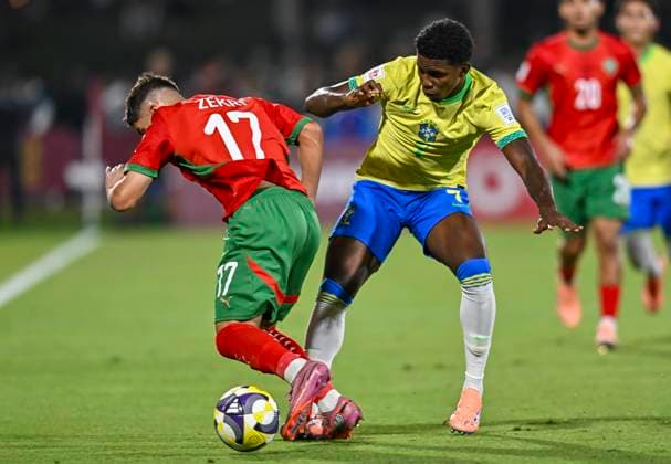 Morocco v Brazil : Quarter-final- FIFA U-17 World Cup Qatar 2025 Ruan Pablo (R) of Brazil and Moncef Zekri of Morocco in action during the FIFA U-17 World Cup Qatar 2025 Quarter-final match between Morocco and Brazil in Doha, Qatar, on November 21, 2025. DOHA Qatar Copyright: xNOUSHADxTHEKKAYILx