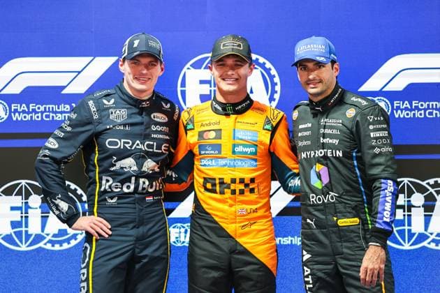 (251122) -- LAS VEGAS, Nov. 22, 2025 -- First-placed McLaren s British driver Lando Norris (C), second-placed Red Bull s Dutch driver Max Verstappen (L) and third-placed Williams Spanish driver Carlos Sainz pose on the podium after the qualifying session of the 2025 Formula One U.S. Grand Prix at Las Vegas Circuit, in Las Vegas, the United States, Nov. 21, 2025. (Photo by Xinhua) (SP)U.S.-LAS VEGAS-F1-GRAND PRIX-QUALIFYING SESSION QianxJun 