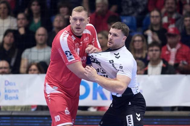 Dainis Kristopans (MT Melsungen 10) und Johannes Golla (SG Flensburg-Handewitt 4) , GER, MT Melsungen - SG Flensburg-Handewitt, Handball, 1. Bundesliga, 13. Spieltag, Saison 2025 2026, 21.11.2025, GER, MT Melsungen - SG Flensburg-Handewitt, Handball, 1. Bundesliga, 13. Spieltag, Saison 2025 2026, 21.11.2025 Kassel Copyright: xEibner-Pressefotox xRolandxSippelx EP_RSL