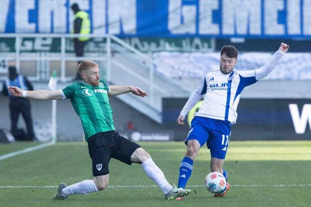 2. Fußball Bundesliga: SC Preußen Münster - FC Schalke 04; 22.11.2025 Mikkel kirkeskov (SC Preußen Münster, 2), Adrian Gantenbein (FC Schalke 04, 17) 2. Fußball Bundesliga 13. Spieltag: SC Preußen Münster - FC Schalke 04; LVM-Preußenstadion, Münster; 22.11.2025 DFL regulations prohibit any use of photographs as image sequences and or quasi video. Copyright: xBEAUTIFULxSPORTS Buriakovx