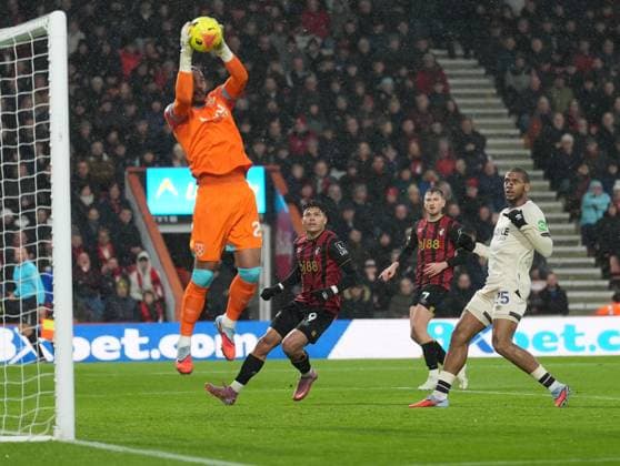 Evanilson of Bournemouth looks for an opportunity but the ball is plucked out the air by Alphonse Areola goalkeeper of West Ham United. AFC Bournemouth v West Ham United, Premier League, Football, Vitality Stadium, Bournemouth, UK - 22 Nov 2025Bournemouth Vitality Stadium United Kingdom EDITORIAL USE ONLY No use with unauthorised audio, video, data, fixture lists, club league logos or live services. Online in-match use limited to 120 images, no video emulation. No use in betting, games or single club league player publications. Copyright: xSeanxRyan Shutterstockx 15860645r