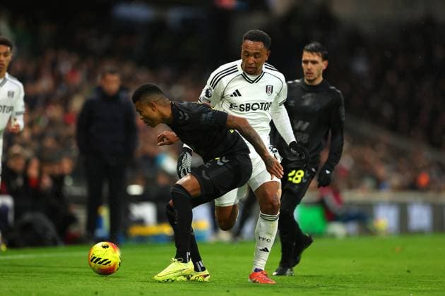 22nd November 2025; Craven Cottage, Fulham, London, England; Premier League Football, Fulham versus Sunderland; Reinildo Mandava of Sunderland challenged by Kenny Tete of Fulham  JohnxPatrickxFletcher