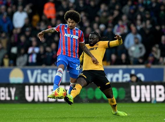 Chris Richards of Crystal Palace and Tolu Arokodare of Wolverhampton Wanderers Wolverhampton Wanderers v Crystal Palace, Premier League, Football, Molineux, Wolverhampton, UK - 22 Nov 2025Wolverhampton Molineux United Kingdom EDITORIAL USE ONLY No use with unauthorised audio, video, data, fixture lists, club league logos or live services. Online in-match use limited to 120 images, no video emulation. No use in betting, games or single club league player publications. Copyright: xAnnaxGowthorpe Shutterstockx 15860649s