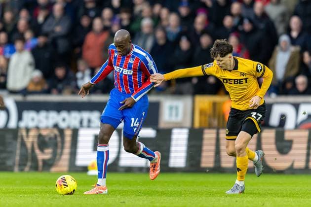 Wolverhampton Wanderers v Crystal Palace Premier League 22 11 2025. Crystal Palace forward Jean-Philippe Mateta (14) battles for possession with Wolverhampton Wanderers defender Pedro Lima (37) during the Premier League match between Wolverhampton Wanderers and Crystal Palace at Molineux, Wolverhampton, England on 22 November 2025. Editorial use only DataCo restrictions apply See www.football-dataco.com , Copyright: xManjitxNarotrax PSI-23244-0014