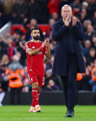 Mohamed Salah of Liverpool thanks the fans at the end of the match behind manager Arne Slot Liverpool v Nottingham Forest, Premier League, Football, Anfield, Liverpool, UK - 22 Nov 2025Liverpool Anfield United Kingdom EDITORIAL USE ONLY No use with unauthorised audio, video, data, fixture lists, club league logos or live services. Online in-match use limited to 120 images, no video emulation. No use in betting, games or single club league player publications.  Copyright: xMattxWest Shutterstockx 15860648ba