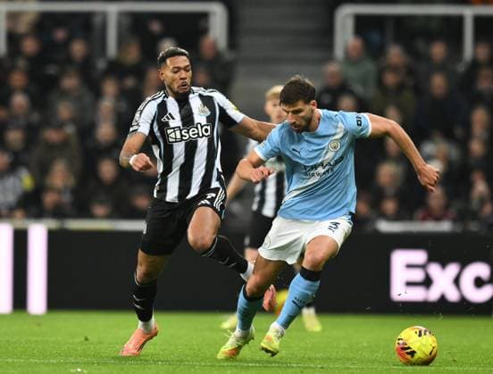 Ruben Dias of Manchester City fends off Joelinton of Newcastle United Newcastle United v Manchester City, Premier League, Football, St James Park, Newcastle, UK - 22 Nov 2025Newcastle St James Park United Kingdom EDITORIAL USE ONLY No use with unauthorised audio, video, data, fixture lists, club league logos or live services. Online in-match use limited to 120 images, no video emulation. No use in betting, games or single club league player publications. Copyright: xRichardxLee Shutterstockx 15860905aa