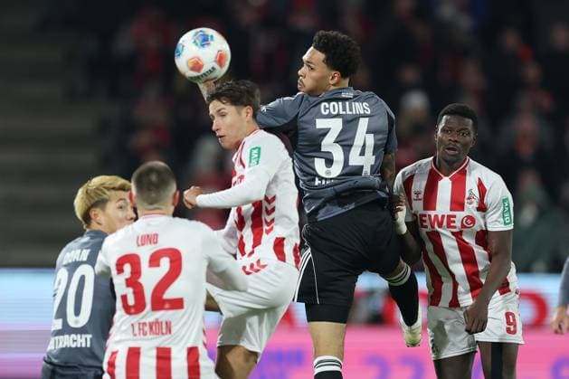GER, 1.FBL, 1. FC Koeln vs. Eintracht Frankfurt 22.11.2025, Rheinenergie Stadion, Koeln, GER, 1.FBL, 1. FC Koeln vs. Eintracht Frankfurt, im Bild: Denis Huseinbasic (FC Koeln 8), Nnamdi Collins (Frankfurt 34), Ragnar Ache (FC Koeln 9), Kristoffer Lund (FC Koeln 32),