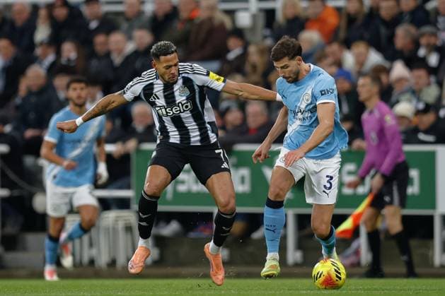 Newcastle United v Manchester City Premier League 22 11 2025. Joelinton of Newcastle United closes down Ruben Dias of Manchester City during the Premier League match between Newcastle United and Manchester City at St. James s Park, Newcastle, England on 22 November 2025. Newcastle St. James s Park Tyne and Wear England Editorial use only DataCo restrictions apply See www.football-dataco.com , Copyright: xCraigxCowanx PSI-23242-0146