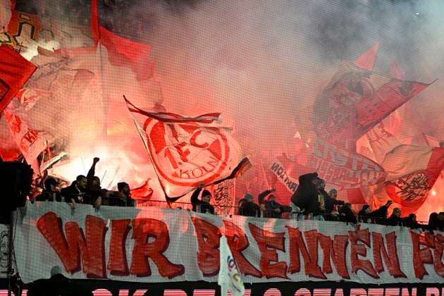 Fans 1. FC Koeln zuenden bengalisches Feuer - Wir brennen -. Fussball 1. Bundesliga, 11.Spieltag, 1. FC Koeln - Eintracht Frankfurt 3:4, am 22.11.2025 in Koeln Deutschland. DFL regulations prohibit any use of photographs as image sequences and or quasi-video Â