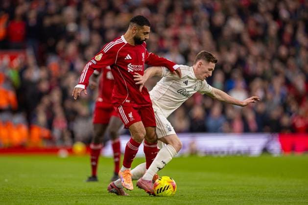(251123) -- LONDON, Nov. 23, 2025 -- Liverpool s Mohamed Salah (L) is challenged by Nottingham Forest s Elliot Anderson during the English Premier League match between Liverpool FC and Nottingham Forest FC in Liverpool, Britain, on Nov. 22, 2025. FOR EDITORIAL USE ONLY. NOT FOR SALE FOR MARKETING OR ADVERTISING CAMPAIGNS. NO USE WITH UNAUTHORIZED AUDIO, VIDEO, DATA, FIXTURE LISTS, CLUB LEAGUE LOGOS OR LIVE SERVICES. ONLINE IN-MATCH USE LIMITED TO 45 IMAGES, NO VIDEO EMULATION. NO USE IN BETTING, GAMES OR SINGLE CLUB LEAGUE PLAYER PUBLICATIONS. (SP)BRITAIN-LONDON-FOOTBALL-ENGLISH PREMIER LEAGUE-LIVERPOOL VS NOTTINGHAM FOREST LixYing 