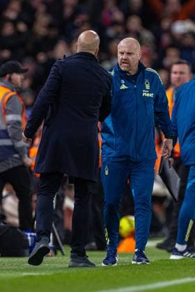 (251123) -- LONDON, Nov. 23, 2025 -- Nottingham Forest s head coach Sean Dyche (R) shakes hands with Liverpool s head coach Arne Slot after the English Premier League match between Liverpool FC and Nottingham Forest FC in Liverpool, Britain, on Nov. 22, 2025. FOR EDITORIAL USE ONLY. NOT FOR SALE FOR MARKETING OR ADVERTISING CAMPAIGNS. NO USE WITH UNAUTHORIZED AUDIO, VIDEO, DATA, FIXTURE LISTS, CLUB LEAGUE LOGOS OR LIVE SERVICES. ONLINE IN-MATCH USE LIMITED TO 45 IMAGES, NO VIDEO EMULATION. NO USE IN BETTING, GAMES OR SINGLE CLUB LEAGUE PLAYER PUBLICATIONS. (SP)BRITAIN-LONDON-FOOTBALL-ENGLISH PREMIER LEAGUE-LIVERPOOL VS NOTTINGHAM FOREST LixYing 