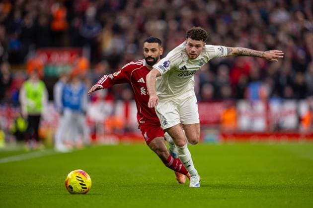 (251123) -- LONDON, Nov. 23, 2025 -- Liverpool s Mohamed Salah (L) vies with Nottingham Forest s Neco Williams during the English Premier League match between Liverpool FC and Nottingham Forest FC in Liverpool, Britain, on Nov. 22, 2025. FOR EDITORIAL USE ONLY. NOT FOR SALE FOR MARKETING OR ADVERTISING CAMPAIGNS. NO USE WITH UNAUTHORIZED AUDIO, VIDEO, DATA, FIXTURE LISTS, CLUB LEAGUE LOGOS OR LIVE SERVICES. ONLINE IN-MATCH USE LIMITED TO 45 IMAGES, NO VIDEO EMULATION. NO USE IN BETTING, GAMES OR SINGLE CLUB LEAGUE PLAYER PUBLICATIONS. (SP)BRITAIN-LONDON-FOOTBALL-ENGLISH PREMIER LEAGUE-LIVERPOOL VS NOTTINGHAM FOREST LixYing 