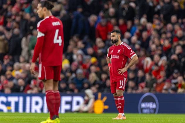 (251123) -- LONDON, Nov. 23, 2025 -- Liverpool s Mohamed Salah (R) reacts as Nottingham Forest scores a third goal during the English Premier League match between Liverpool FC and Nottingham Forest FC in Liverpool, Britain, on Nov. 22, 2025. FOR EDITORIAL USE ONLY. NOT FOR SALE FOR MARKETING OR ADVERTISING CAMPAIGNS. NO USE WITH UNAUTHORIZED AUDIO, VIDEO, DATA, FIXTURE LISTS, CLUB LEAGUE LOGOS OR LIVE SERVICES. ONLINE IN-MATCH USE LIMITED TO 45 IMAGES, NO VIDEO EMULATION. NO USE IN BETTING, GAMES OR SINGLE CLUB LEAGUE PLAYER PUBLICATIONS. (SP)BRITAIN-LONDON-FOOTBALL-ENGLISH PREMIER LEAGUE-LIVERPOOL VS NOTTINGHAM FOREST LixYing 