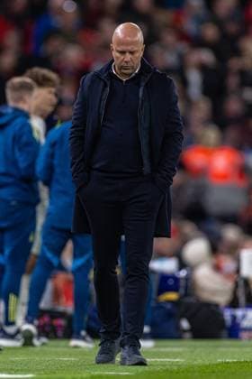 (251123) -- LONDON, Nov. 23, 2025 -- Liverpool s head coach Arne Slot reacts after the English Premier League match between Liverpool FC and Nottingham Forest FC in Liverpool, Britain, on Nov. 22, 2025. FOR EDITORIAL USE ONLY. NOT FOR SALE FOR MARKETING OR ADVERTISING CAMPAIGNS. NO USE WITH UNAUTHORIZED AUDIO, VIDEO, DATA, FIXTURE LISTS, CLUB LEAGUE LOGOS OR LIVE SERVICES. ONLINE IN-MATCH USE LIMITED TO 45 IMAGES, NO VIDEO EMULATION. NO USE IN BETTING, GAMES OR SINGLE CLUB LEAGUE PLAYER PUBLICATIONS. (SP)BRITAIN-LONDON-FOOTBALL-ENGLISH PREMIER LEAGUE-LIVERPOOL VS NOTTINGHAM FOREST LixYing 