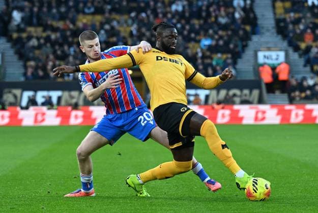 Adam Wharton of Crystal Palace and Tolu Arokodare of Wolverhampton Wanderers Wolverhampton Wanderers v Crystal Palace, Premier League, Football, Molineux, Wolverhampton, UK - 22 Nov 2025Wolverhampton Molineux United Kingdom EDITORIAL USE ONLY No use with unauthorised audio, video, data, fixture lists, club league logos or live services. Online in-match use limited to 120 images, no video emulation. No use in betting, games or single club league player publications. Copyright: xAnnaxGowthorpe Shutterstockx 15860649be