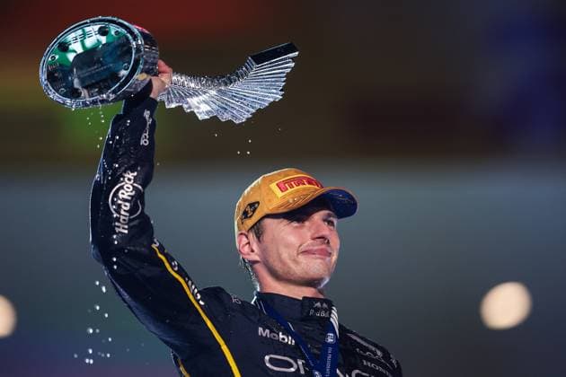 F1 - LAS VEGAS GRAND PRIX 2025 VERSTAPPEN Max (ned), Red Bull Racing RB21, portrait podium celebration with Moet and Chandon during the 2025 Formula 1 Las Vegas Grand Prix, 22th round of the 2025 FIA Formula One World Championship, WM, Weltmeisterschaft from November 21 to 23, 2025 on the Las Vegas Strip Circuit, in Paradise, Nevada, United States of America - ParadiseUnited States  Copyright: xEricxAlonsox