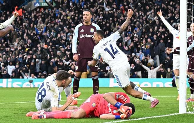 Lukas Nmecha of Leeds United celebrates after scoring the team s first goal Leeds United v Aston Villa, Premier League, Football, Elland Road, Leeds, UK - 23 Nov 2025Leeds Elland Road United Kingdom EDITORIAL USE ONLY No use with unauthorised audio, video, data, fixture lists, club league logos or live services. Online in-match use limited to 120 images, no video emulation. No use in betting, games or single club league player publications. Copyright: xAnnaxGowthorpe Shutterstockx 15860945ac