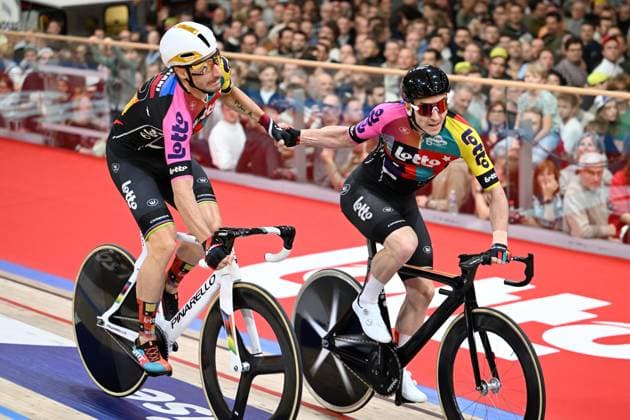 Italian Elia Viviani, Belgian Jasper De Buyst and pictured in action during the last day of the Zesdaagse Vlaanderen-Gent six-day indoor Track cycling, Rad, Radsport, Bahnrad, Bahn event at the indoor cycling arena t Kuipke, Sunday 23 November 2025, in Gent. MAARTENxSTRAETEMANS  x143648629x